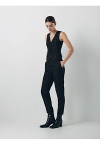 Reserved - Spodnie z metalicznym efektem - czarny. Kolor: czarny. Materiał: tkanina, wiskoza