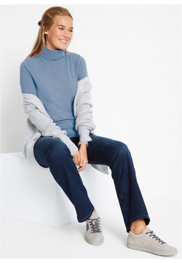 bonprix - Modelujące dżinsy o kroju bootcut, mid waist. Kolor: niebieski