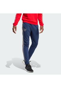 Adidas - Spodnie dresowe Arsenal DNA. Kolor: niebieski. Materiał: dresówka