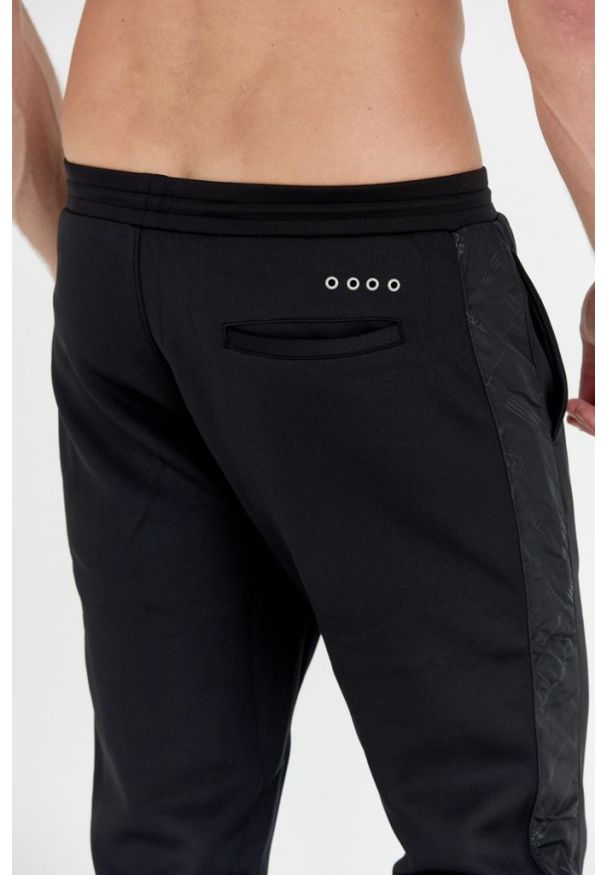 La Martina - LA MARTINA Czarne męskie spodnie dresowe z lampasami, Rozmiar M. Kolor: czarny. Materiał: dresówka