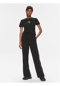 Calvin Klein Jeans Spodnie dresowe J20J223118 Czarny Relaxed Fit. Kolor: czarny. Materiał: bawełna