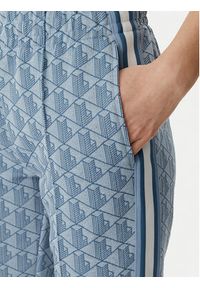 Lacoste Spodnie dresowe XF9313 Niebieski jasny Regular Fit. Kolor: niebieski. Materiał: syntetyk #4