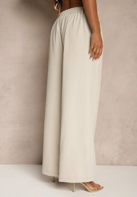 Renee - Jasnobeżowe Spodnie o Szerokim Kroju High Waist Dolarenna. Okazja: na co dzień. Stan: podwyższony. Kolor: beżowy. Styl: elegancki, casual