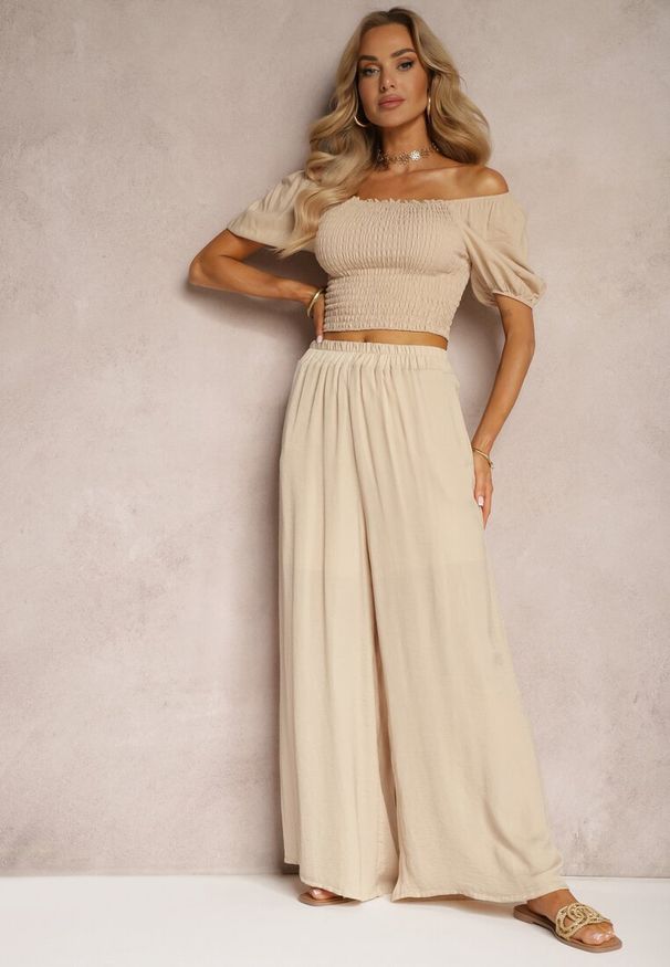 Renee - Beżowe Wiskozowe Spodnie Szerokie High Waist Rissalene. Okazja: do pracy, na spotkanie biznesowe. Stan: podwyższony. Kolor: beżowy. Materiał: wiskoza. Styl: elegancki, biznesowy