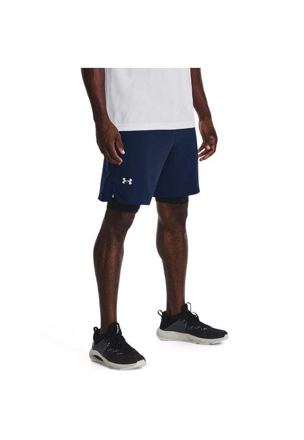 Spodnie treningowe męskie Under Armour 1370382012. Kolor: niebieski. Długość: krótkie