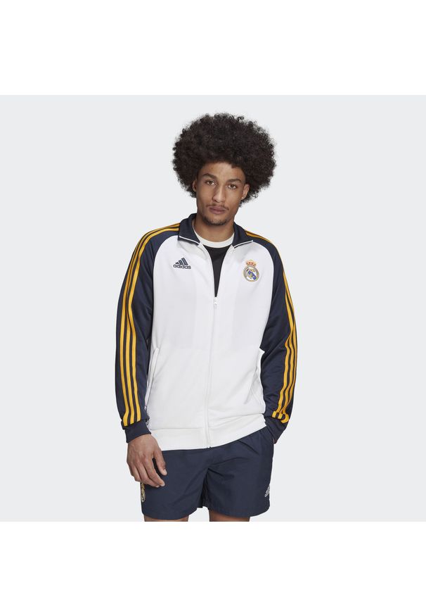 Adidas - Real Madrid DNA 3-Stripes Track Top. Kolor: niebieski, wielokolorowy, biały. Materiał: dresówka, materiał