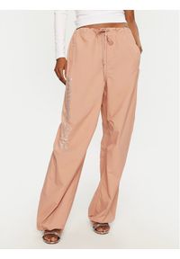Juicy Couture Spodnie dresowe Ayla JCWBJ24306 Beżowy Loose Fit. Kolor: beżowy. Materiał: syntetyk #1