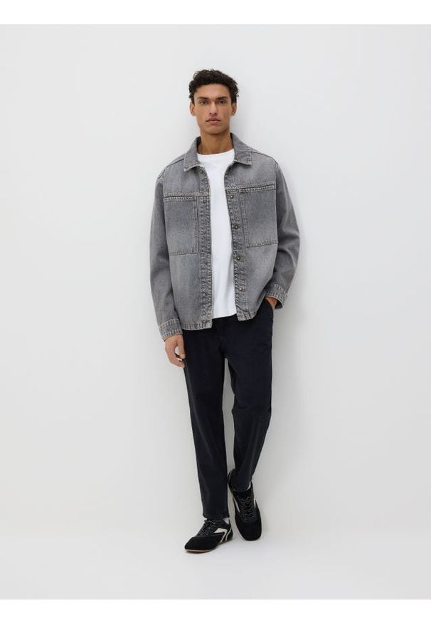 Reserved - Jeansy carrot fit - czarny. Kolor: czarny