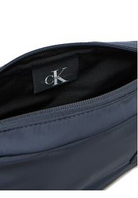 Calvin Klein Jeans Saszetka Sport Essentials Ut Flap Cb22 LV04G3031G Granatowy. Kolor: niebieski. Materiał: materiał