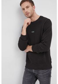 Calvin Klein - Bluza bawełniana. Okazja: na co dzień. Kolor: czarny. Materiał: bawełna. Wzór: gładki. Styl: casual