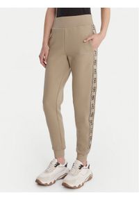 Guess Spodnie dresowe V2YB15 KB3P2 Beżowy Regular Fit. Kolor: beżowy. Materiał: bawełna #1