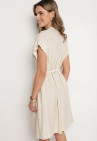 Born2be - Beżowa Sukienka z Wiskozy o Rozkloszowanym Kroju z Paskiem Sepina. Okazja: na co dzień. Typ kołnierza: dekolt w serek. Kolor: beżowy. Materiał: wiskoza. Długość rękawa: krótki rękaw. Wzór: aplikacja. Sezon: lato. Styl: klasyczny, casual, elegancki #4