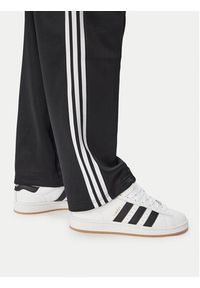 Adidas - adidas Spodnie dresowe adicolor Spacer KS7433 Czarny Baggy Fit. Kolor: czarny. Materiał: bawełna. Sport: turystyka piesza #3