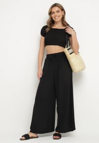 Born2be - Czarne Szerokie Spodnie Typu Palazzo z Wiązaniem Ulialitia. Okazja: na co dzień. Stan: podwyższony. Kolor: czarny. Styl: elegancki, casual #3