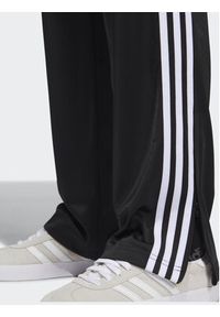 Adidas - adidas Spodnie dresowe adicolor Classics Firebird IJ7055 Czarny Regular Fit. Kolor: czarny. Materiał: syntetyk #6