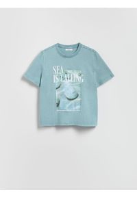 Reserved - T-shirt z nadrukiem - jasnoturkusowy. Kolor: turkusowy. Materiał: bawełna, dzianina. Wzór: nadruk