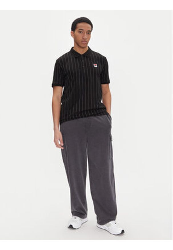 Fila Polo Linter FAM0923 Czarny Regular Fit. Typ kołnierza: polo. Kolor: czarny. Materiał: bawełna