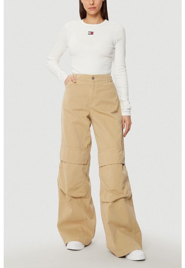 Tommy Jeans - TOMMY JEANS Beżowy damski longsleeve, Rozmiar S. Kolor: beżowy. Długość rękawa: długi rękaw