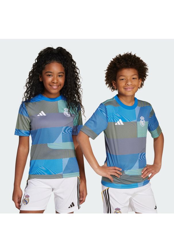 Adidas - Koszulka Real Madrid 25/26 Pre-Match Kids. Kolor: niebieski. Sport: piłka nożna