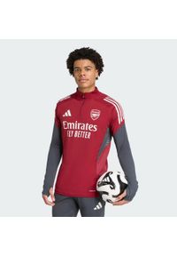Adidas - Koszulka treningowa Arsenal Tiro 25 Competition. Kolor: czerwony, brązowy, wielokolorowy, szary. Materiał: dresówka. Sport: piłka nożna