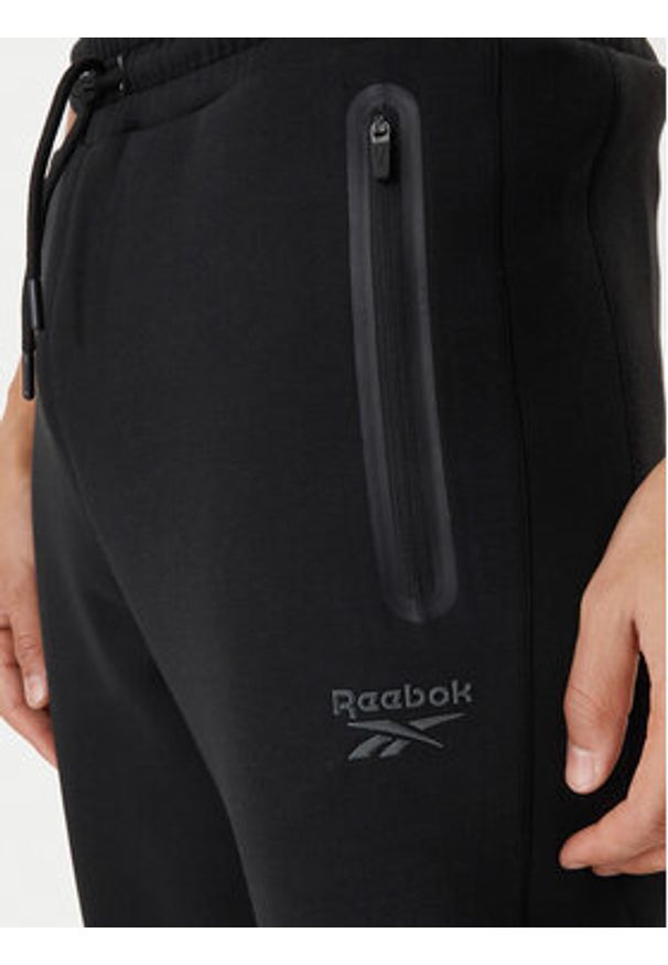 Reebok Spodnie dresowe Andrews RK25545CCM Czarny Regular Fit. Kolor: czarny. Materiał: syntetyk
