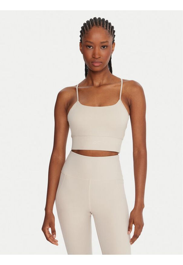 Reebok Biustonosz sportowy Reebok X Ewa Chodakowska RK25310CCW Beżowy. Kolor: beżowy. Materiał: syntetyk