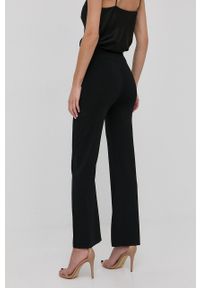 Silvian Heach spodnie damskie kolor czarny dzwony high waist. Stan: podwyższony. Kolor: czarny. Materiał: materiał. Wzór: aplikacja