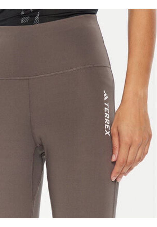 Adidas - adidas Legginsy Terrex Multi IP6883 Brązowy Slim Fit. Kolor: brązowy. Materiał: syntetyk