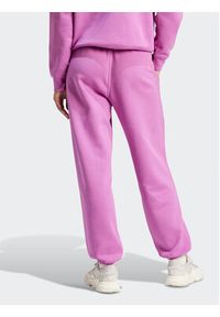 Adidas - adidas Spodnie dresowe Essentials IR5964 Różowy Regular Fit. Kolor: różowy. Materiał: bawełna