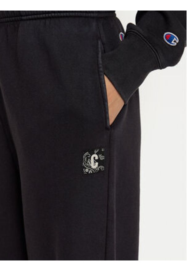 Champion Spodnie dresowe 117661 Czarny Wide Leg. Kolor: czarny. Materiał: bawełna