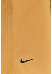 Nike Sportswear Kurtka damska kolor żółty przejściowa oversize. Kolor: żółty. Materiał: tkanina, włókno, materiał. Wzór: gładki #5