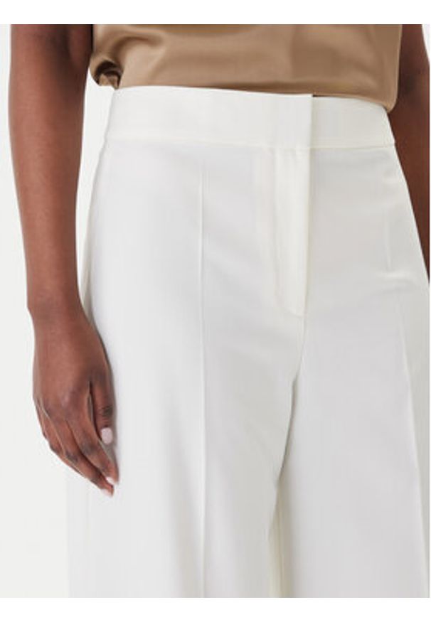 Hugo - HUGO Spodnie materiałowe Huzili 50558131 Écru Wide Leg. Kolor: kremowy. Materiał: syntetyk, wiskoza