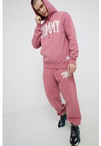 Tommy Jeans Bluza męska kolor różowy z kapturem z aplikacją. Typ kołnierza: kaptur. Kolor: różowy. Materiał: bawełna, dzianina. Wzór: aplikacja