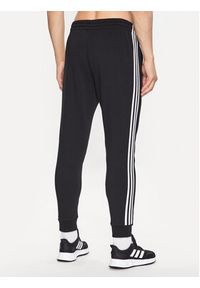 Adidas - adidas Spodnie dresowe IB3999 Czarny Slim Fit. Kolor: czarny. Materiał: bawełna