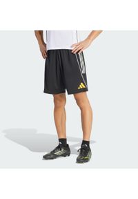 Adidas - Szorty treningowe adidas Real Madrid Avengers 25/26 Tiro25 Competition. Kolor: żółty, czarny, wielokolorowy, biały. Wzór: motyw z bajki. Sport: piłka nożna #1