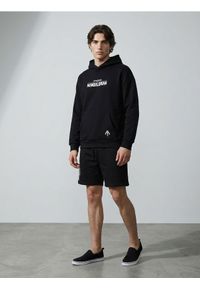 Sinsay - Szorty comfort Star Wars The Mandalorian - czarny. Kolor: czarny. Wzór: motyw z bajki #1