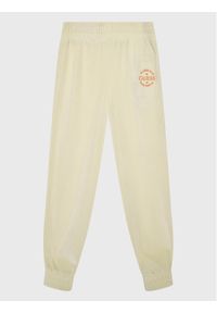 Guess Spodnie dresowe J2BQ12 KBEB0 Beżowy Regular Fit. Kolor: beżowy. Materiał: syntetyk
