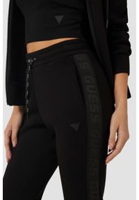 Guess - GUESS Czarne damskie dresowe spodnie Allie Scuba, Rozmiar XS. Kolor: czarny. Materiał: dresówka