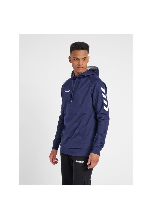 Bluza sportowa z kapturem męska Hummel Go Cotton Hoodie. Typ kołnierza: kaptur. Kolor: niebieski. Sport: taniec, joga i pilates