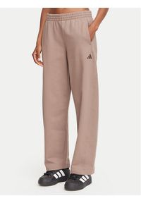Adidas - adidas Spodnie dresowe Small Logo KV9838 Beżowy ciemny Barrel Fit. Kolor: beżowy. Materiał: bawełna #1
