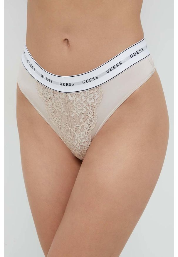 Guess stringi kolor beżowy z koronki. Kolor: beżowy. Materiał: koronka. Wzór: koronka