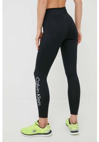 Calvin Klein Performance legginsy treningowe CK Essentials damskie kolor czarny z nadrukiem. Kolor: czarny. Materiał: skóra, dzianina. Wzór: nadruk #4
