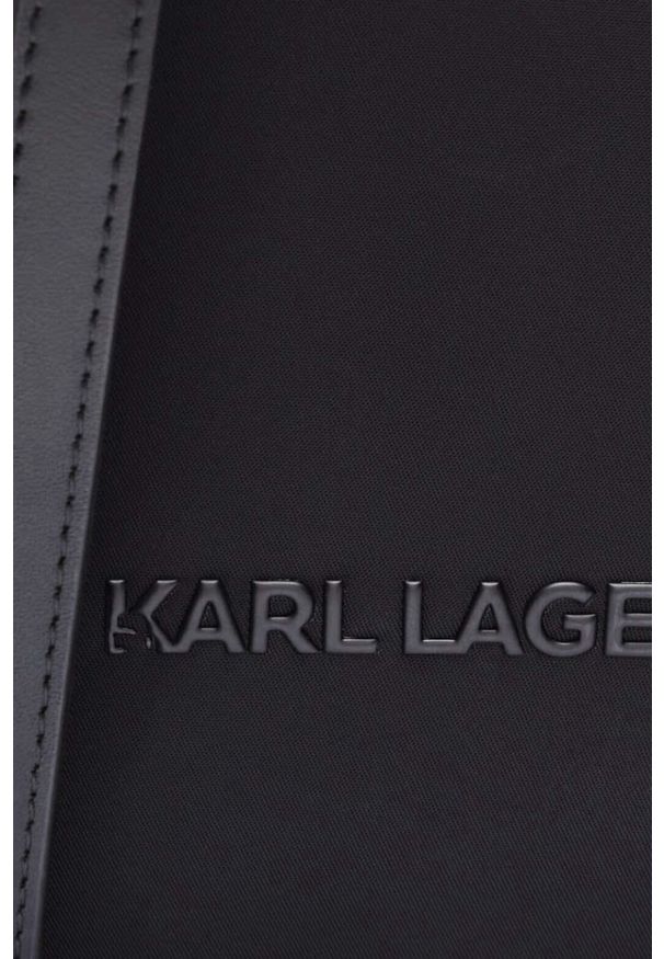 Karl Lagerfeld - KARL LAGERFELD Czarny plecak Ikon Nylon Outline. Kolor: czarny. Materiał: nylon. Wzór: paski. Styl: elegancki