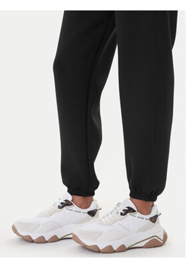 Guess Spodnie dresowe Cecilia V4BB13 K7UW2 Czarny Regular Fit. Kolor: czarny. Materiał: wiskoza