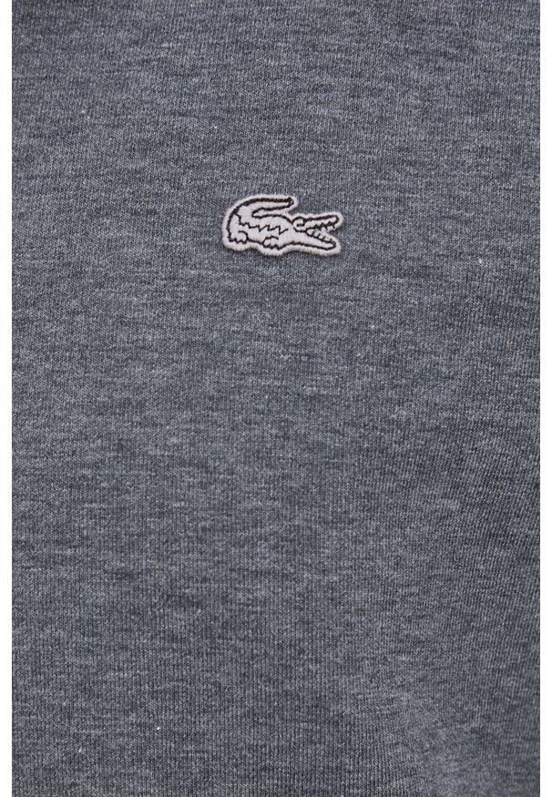 Lacoste Bluza męska kolor szary gładka. Okazja: na co dzień. Kolor: szary. Materiał: dzianina. Długość rękawa: raglanowy rękaw. Wzór: gładki. Styl: casual
