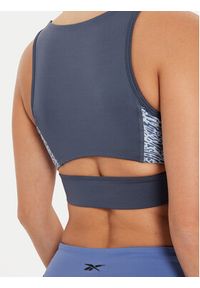 Reebok Biustonosz top Running AOP 100076052 Szary Regular Fit. Kolor: szary. Materiał: syntetyk. Sport: bieganie