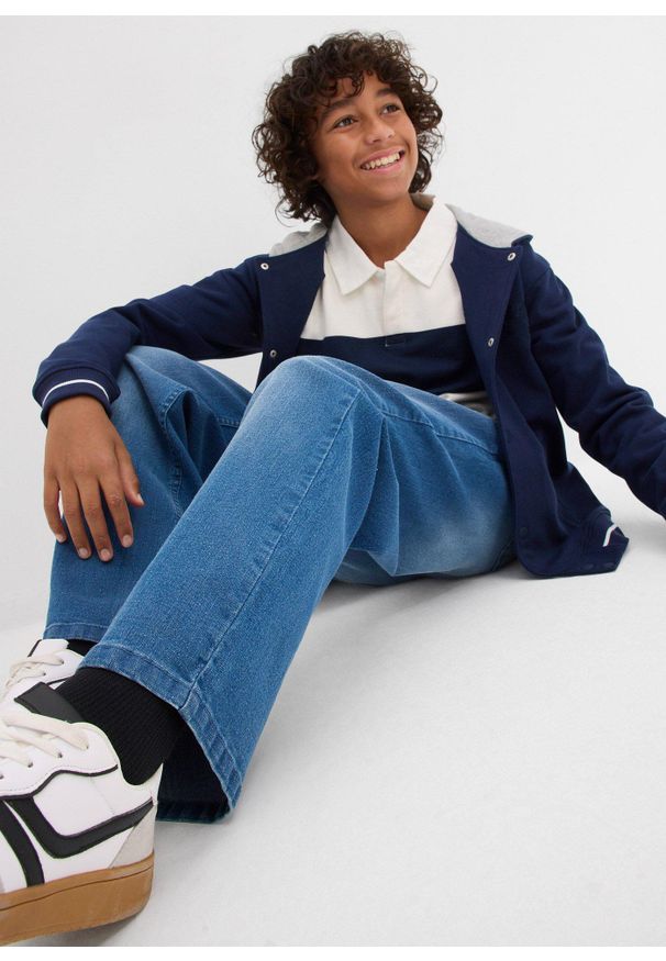 bonprix - Dżinsy loose fit ze stretchem, prosta nogawka. Kolor: niebieski