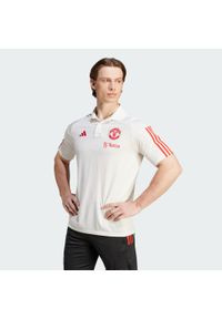 Adidas - Koszulka polo Manchester United Tiro 23. Typ kołnierza: polo. Kolor: biały. Materiał: materiał