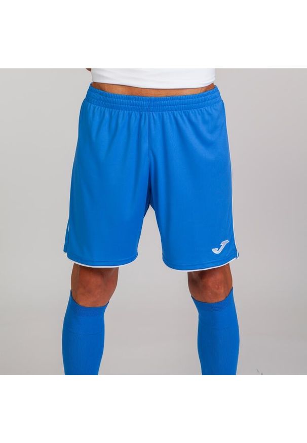 Spodenki do piłki nożnej dla chłopców Joma Liga. Kolor: wielokolorowy, niebieski, biały. Sport: piłka nożna