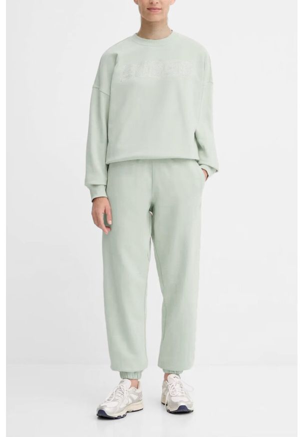 Guess - GUESS Zielone spodnie dresowe damskie Primula, Rozmiar S. Kolor: zielony. Materiał: dresówka